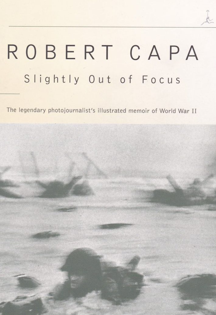 „Slightly out of focus” e o autobiografie înflorită, în care Capa povestește experiențele sale din al Doilea Război Mondial. Pe copertă, una dintre cele 11 imagini care au supraviețuit din Ziua Z, pe plaja botezată de americani „Omaha”.
